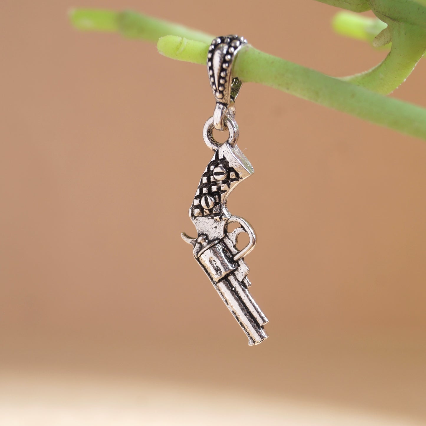 revolver pendant
