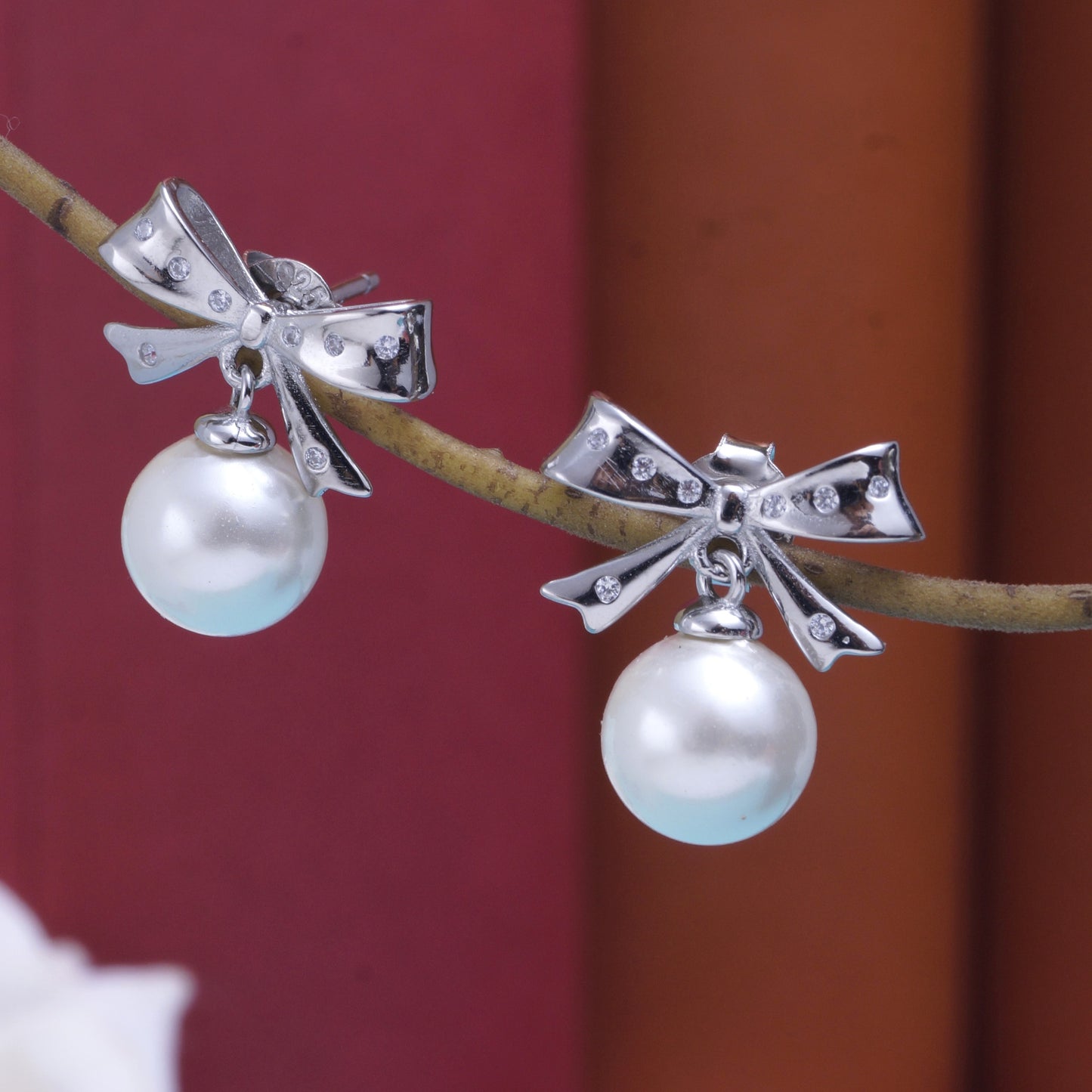 bow earring silver