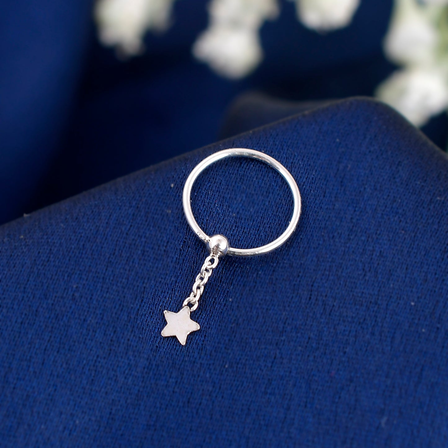 silver nose ring hanging