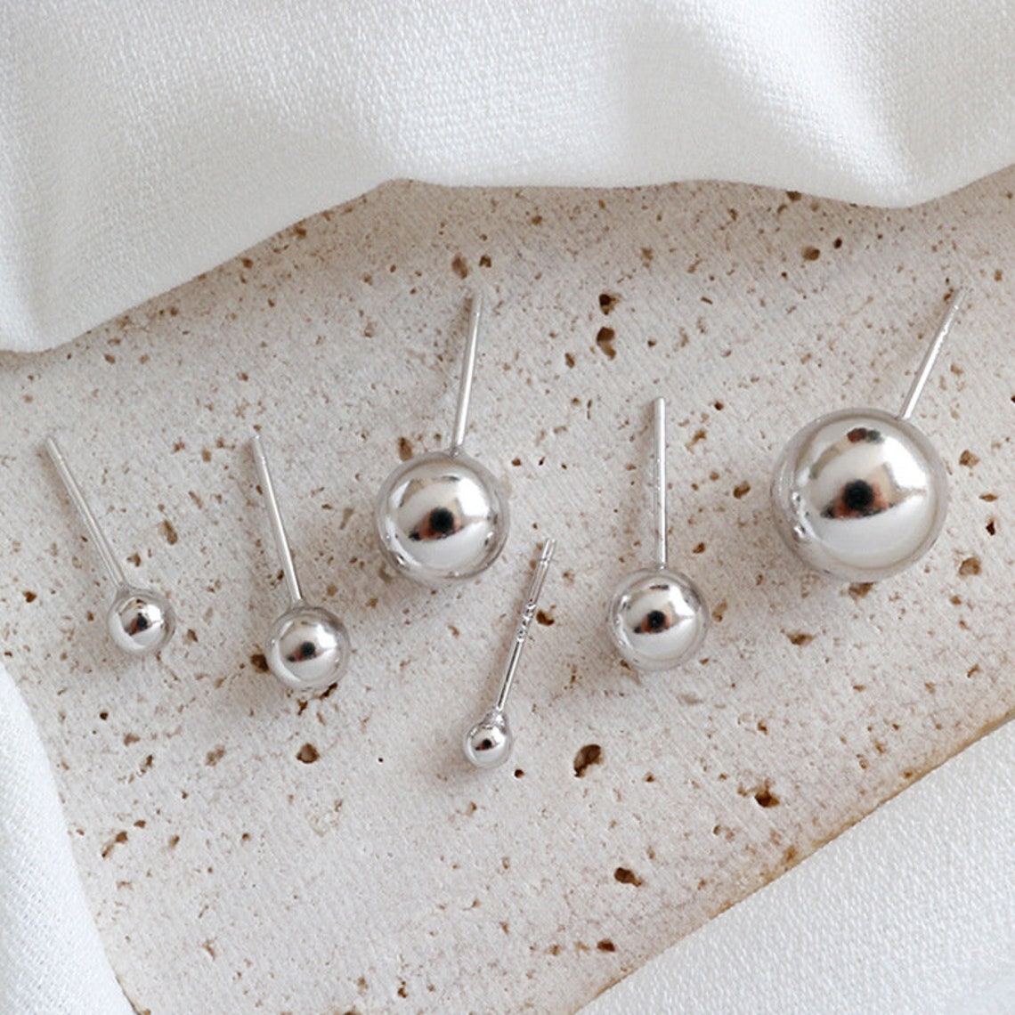 silver ball earring