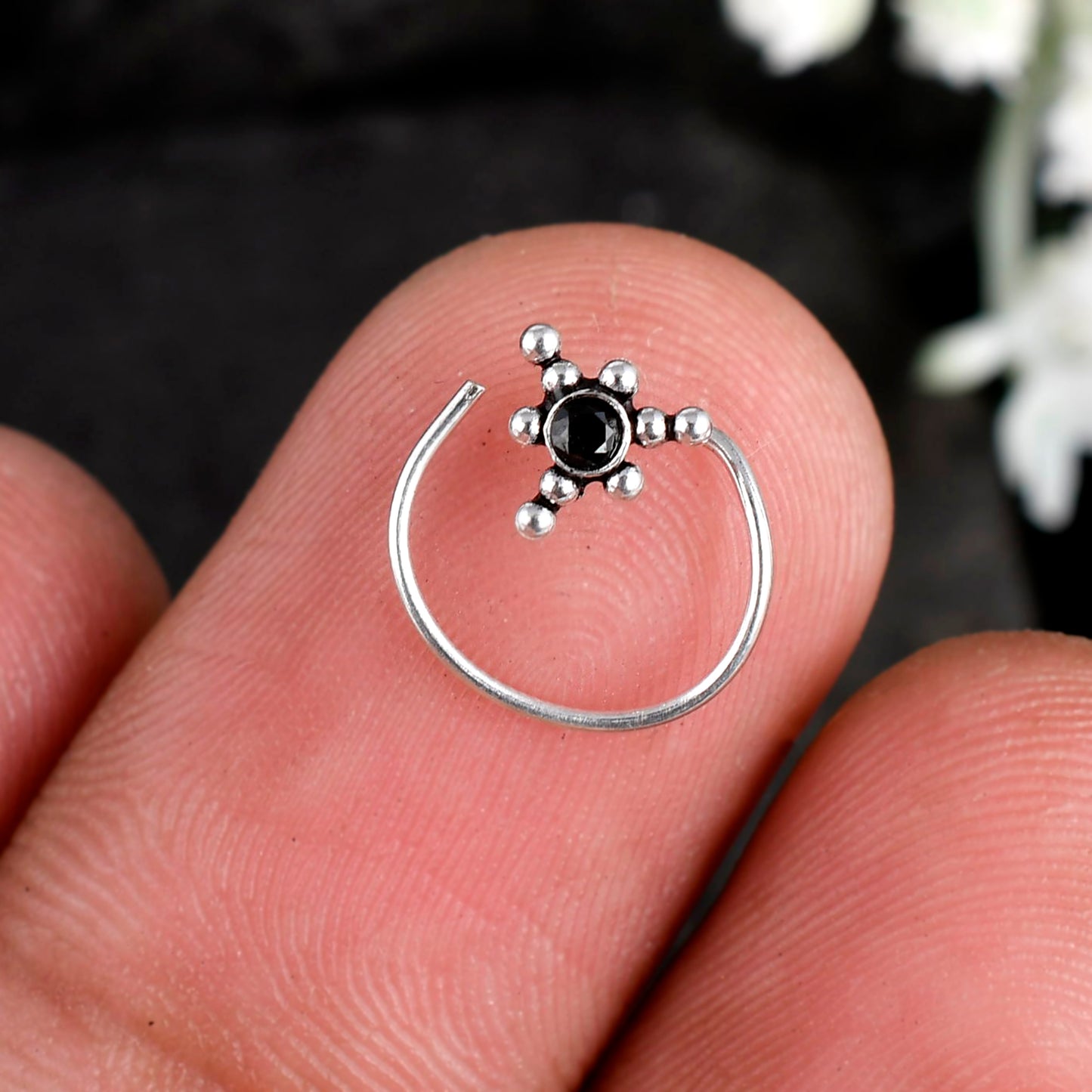 silver nose stud