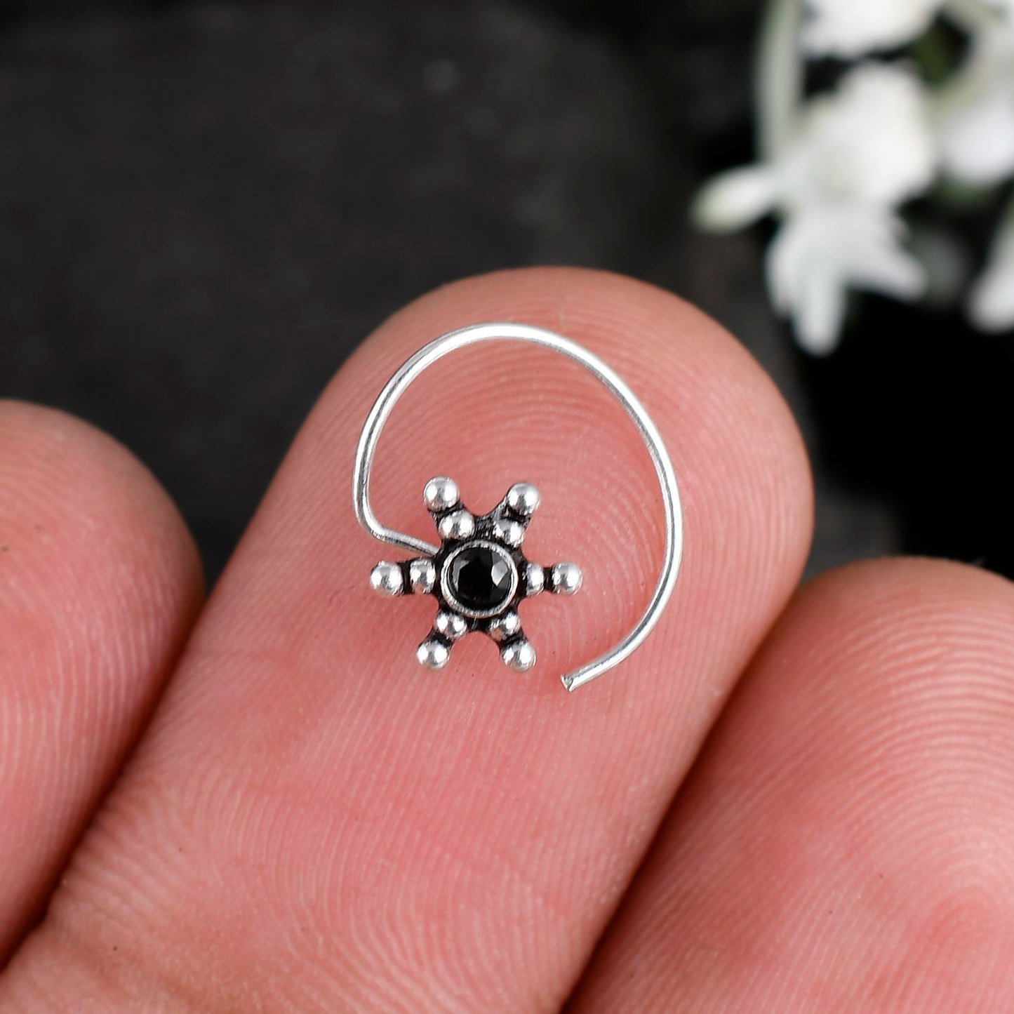 silver nose stud