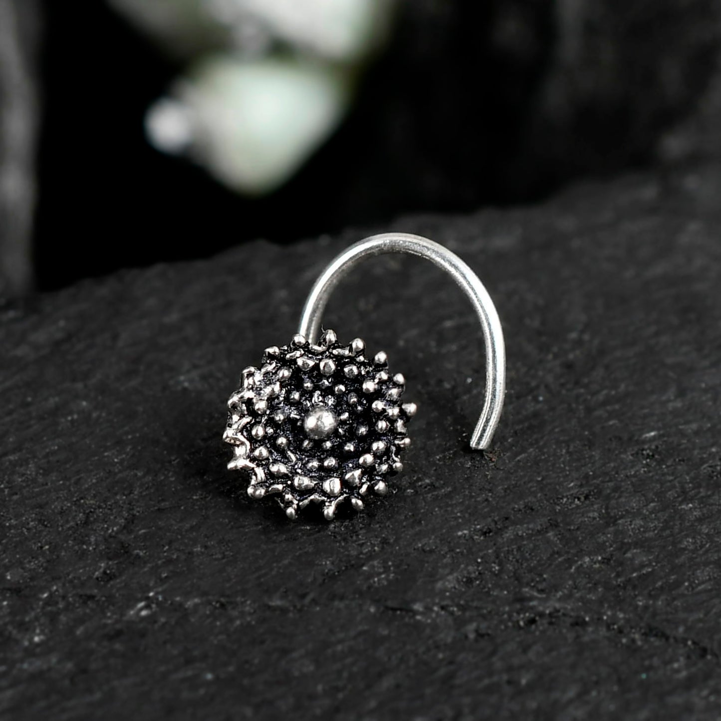 silver nose stud