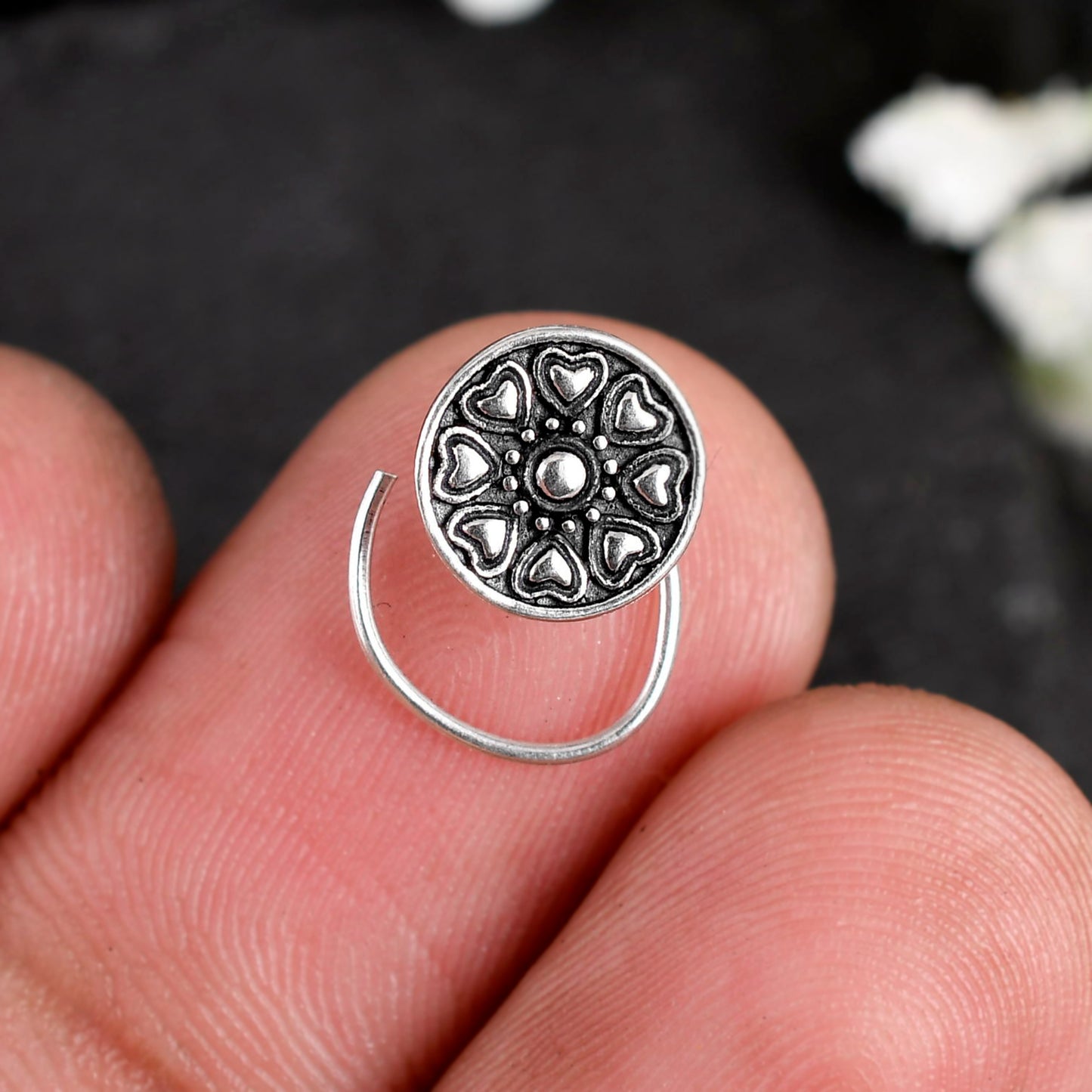 silver nose stud