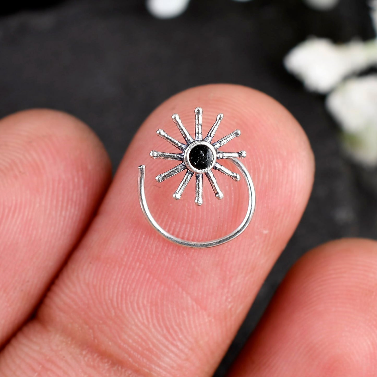 silver nose stud