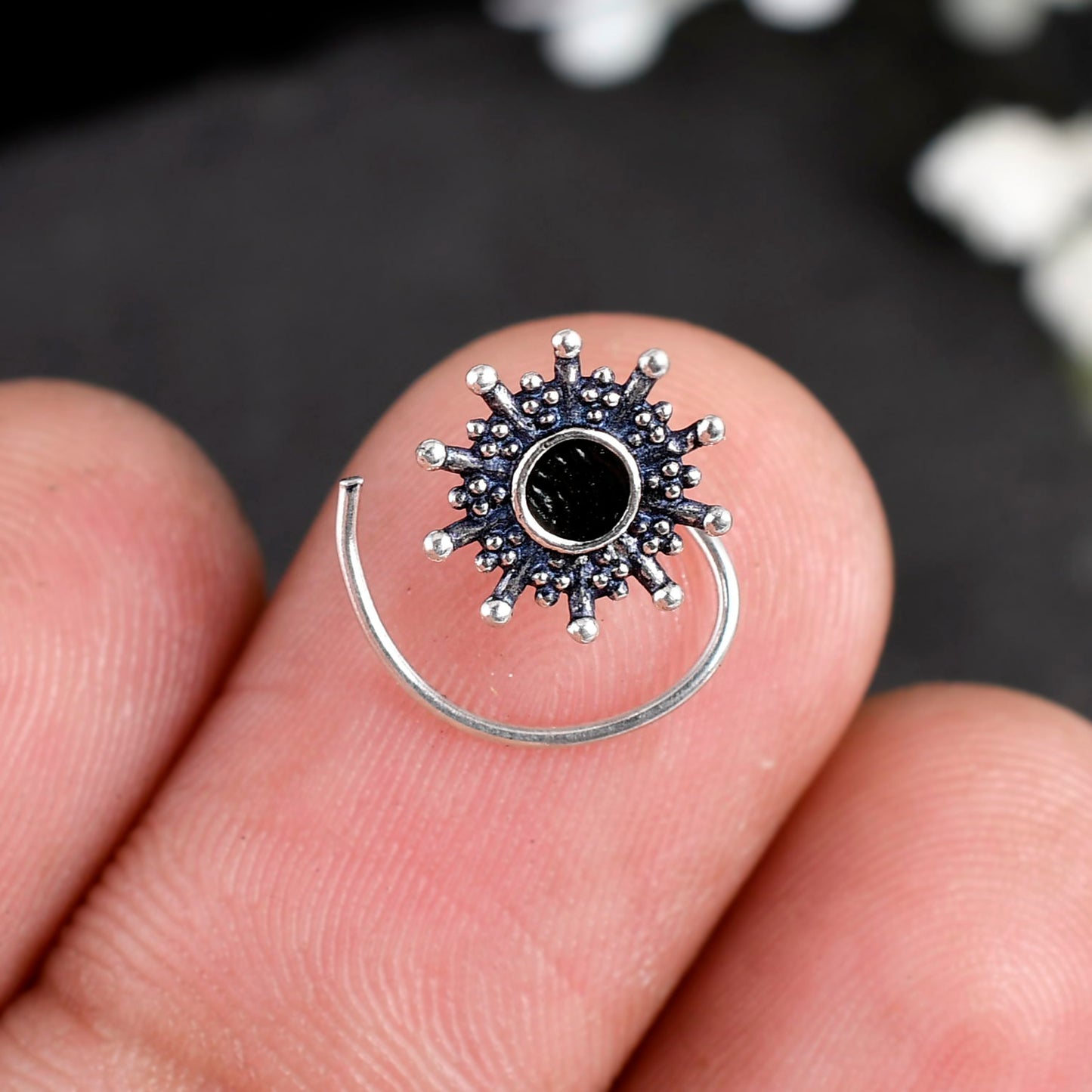 silver nose stud