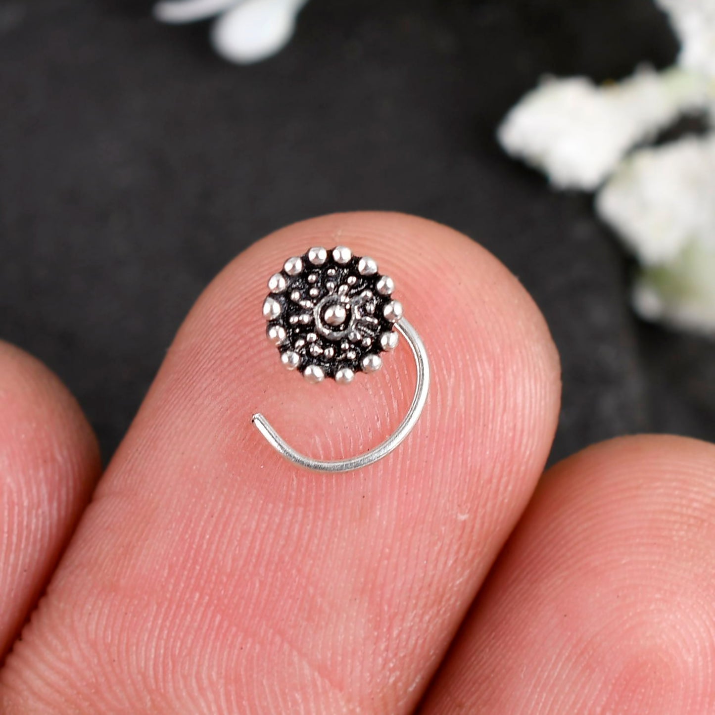 silver nose stud