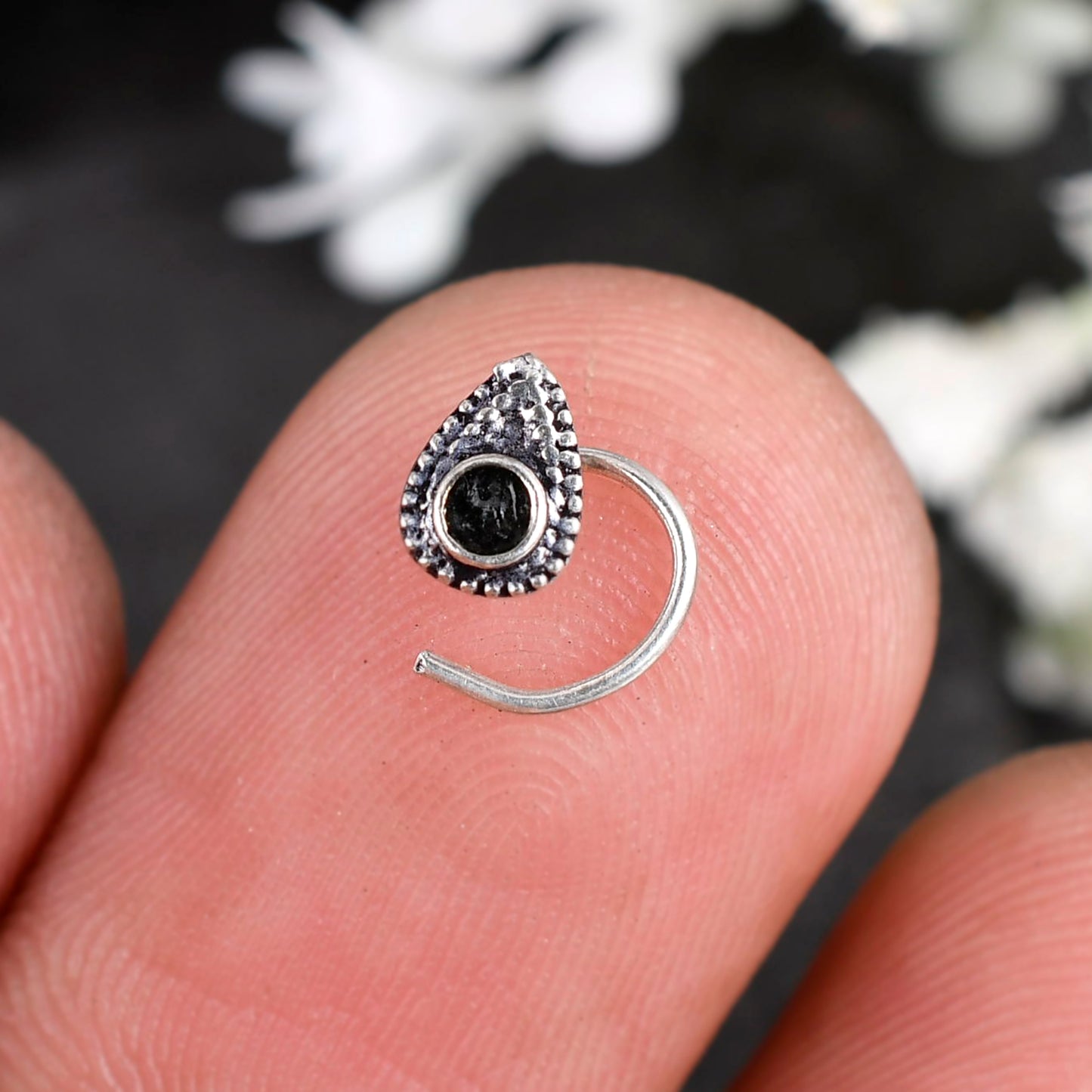 silver nose stud